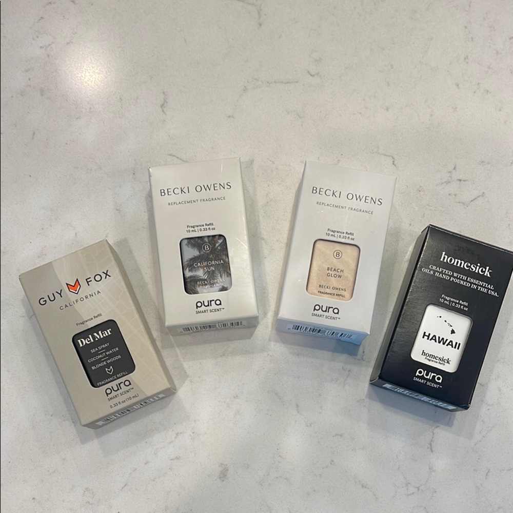 Pura Home Fragrance Set of 5 $50
NEVER USED